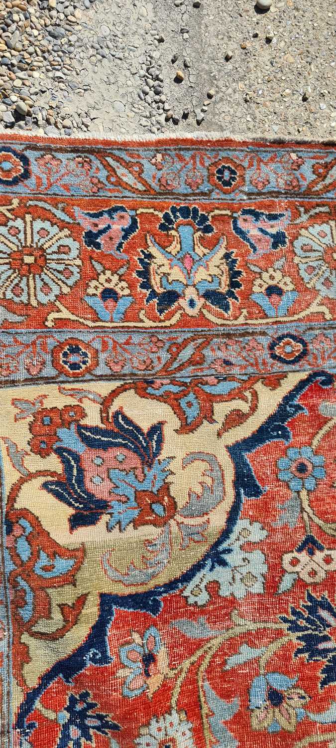 A Heriz wool carpet, - Image 19 of 25
