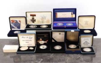 A collection of silver proof coins comprising,