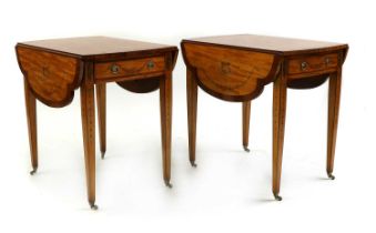A pair of George III style satinwood and walnut Pembroke tables