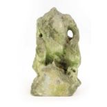 A limestone part gargoyle,