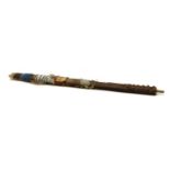 A softwood calumet or smoking pipe stem,