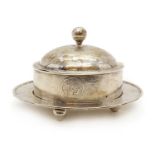 A Chinese silver butter dish and cover,