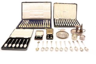 A collection of silver flatware,