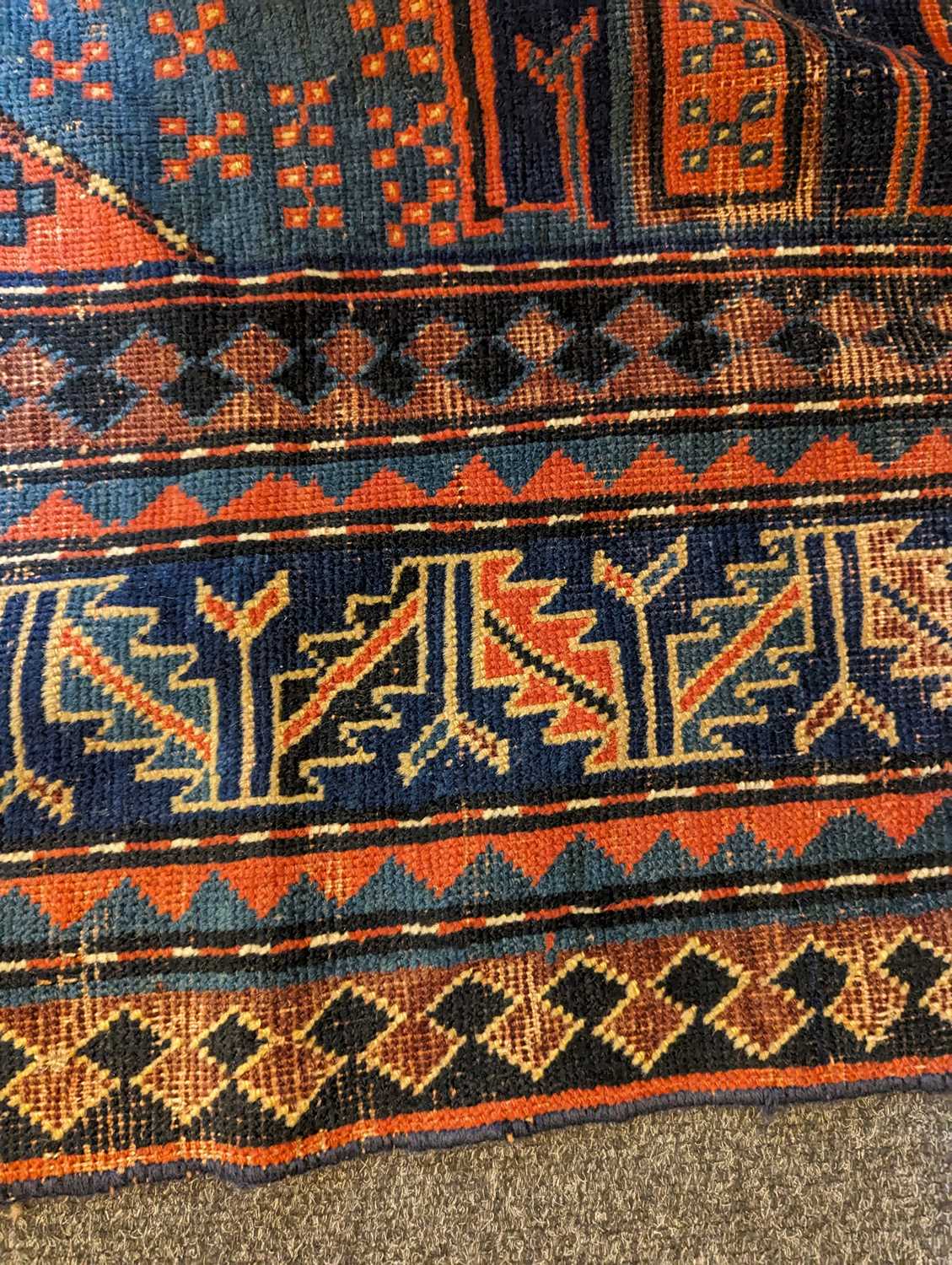 A Kazak wool rug - Image 25 of 49