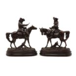 A pair of spelter figures of cavaliers on horseback,