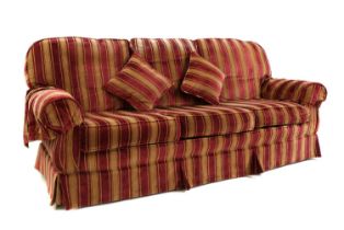 A Peter Guild three seater settee,