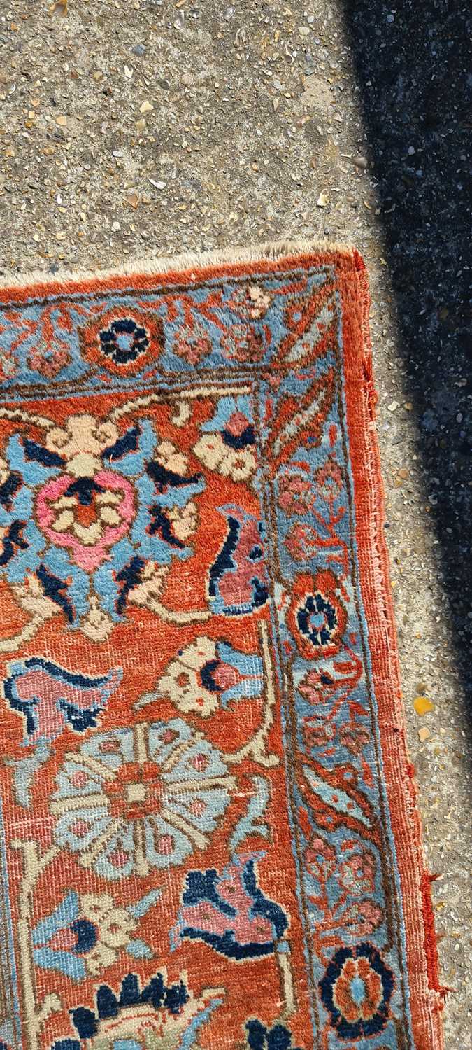 A Heriz wool carpet, - Image 24 of 25