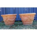 A large pair of Italian terracotta garden urns