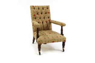 A Victorian mahogany upholstered armchair
