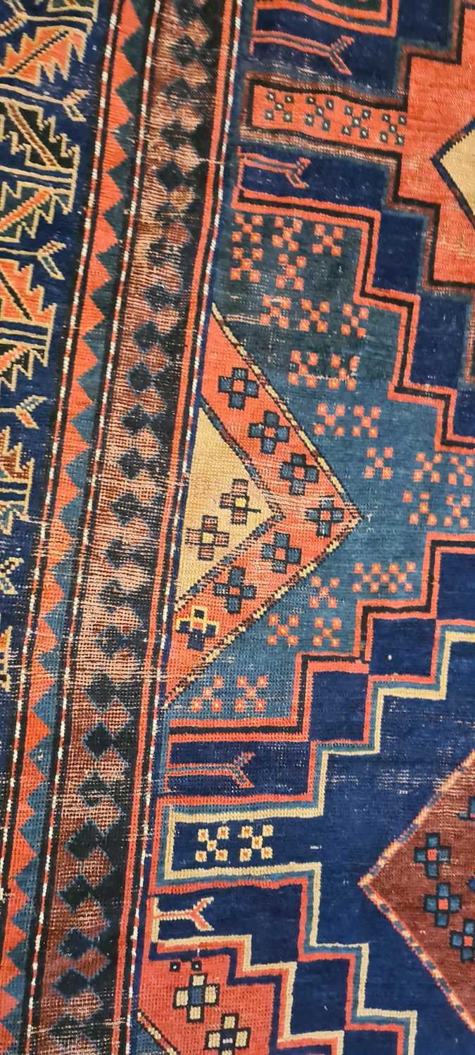 A Kazak wool rug - Image 16 of 49