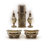 A collection of silver cruet items