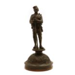 A bronzed Gurkha figure