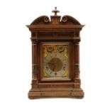 A Victorian oak musical bracket clock