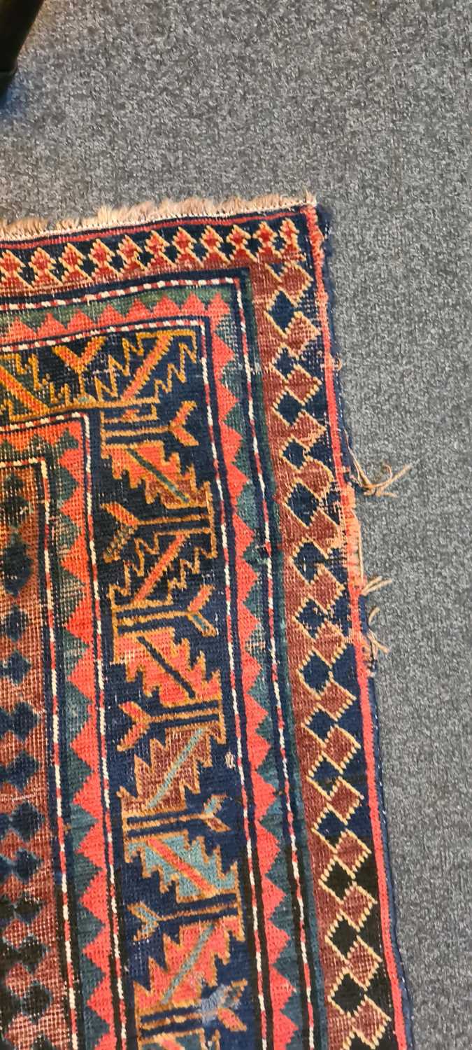A Kazak wool rug - Image 17 of 49