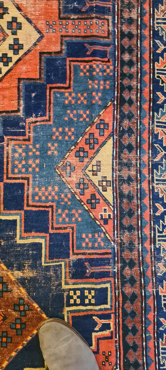 A Kazak wool rug - Image 11 of 49