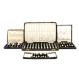 Four cased sets of silver flatware