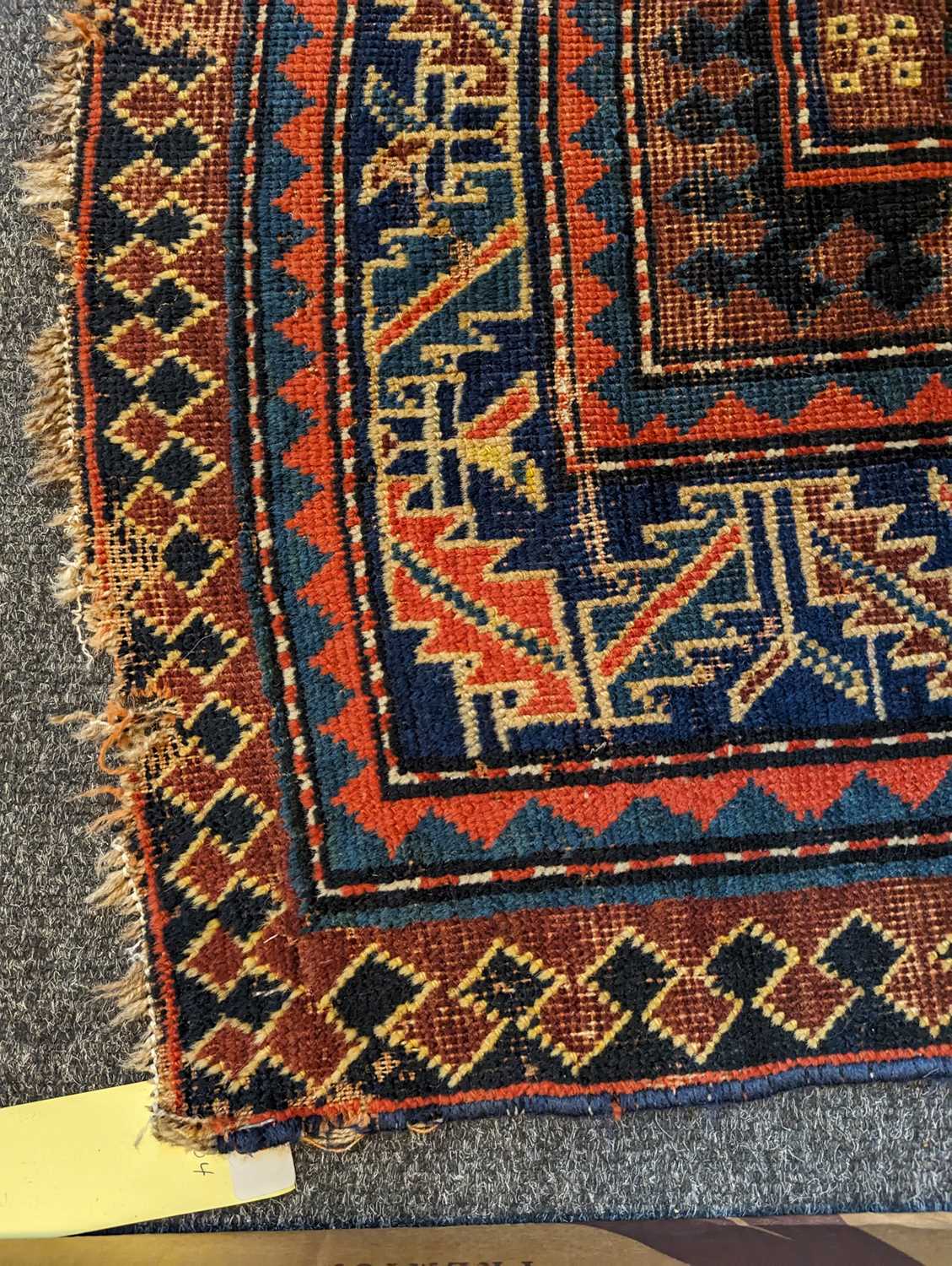 A Kazak wool rug - Image 28 of 49