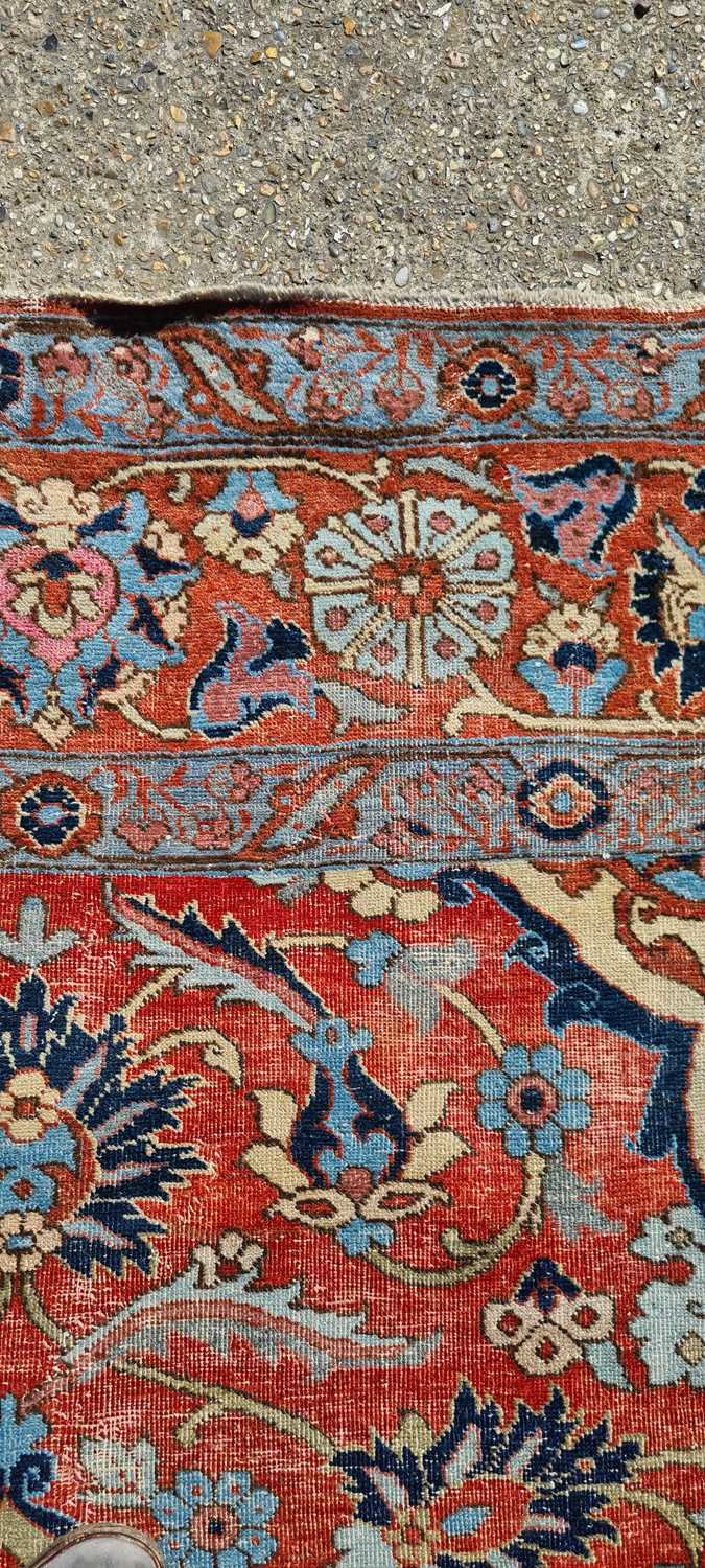 A Heriz wool carpet, - Image 21 of 25