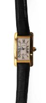 An 18ct gold Cartier Tank Américaine automatic strap watch,