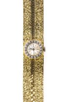 A ladies' 18ct yellow and white gold, diamond set Bucherer mechanical cocktail watch, c.1985,