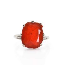 An early 20th century large cushion cut fire opal ring, c.1915,