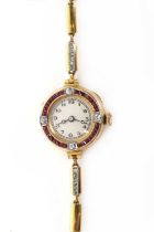 A French ruby, diamond and 18ct gold cocktail watch,