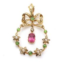An early 20th century split pearl, demantoid garnet and pink tourmaline pendant,