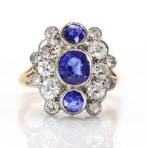 A sapphire and diamond vertical three stone cluster ring,