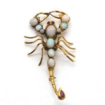 A gold, opal and ruby scorpion brooch,