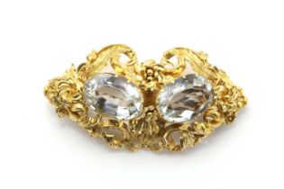 An early Victorian repoussé brooch, c.1840,