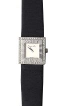 An 18ct white gold diamond set Tiffany 'Atlas' quart strap watch,