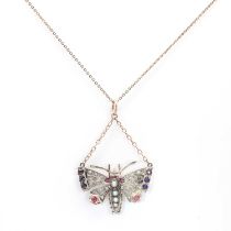 A split pearl, ruby, sapphire and diamond butterfly pendant/brooch, c.1900,