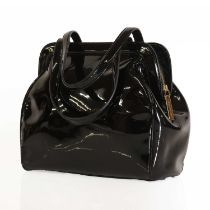 A black patent leather Lulu Guinness bag,