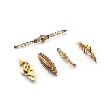 Five gold brooches,