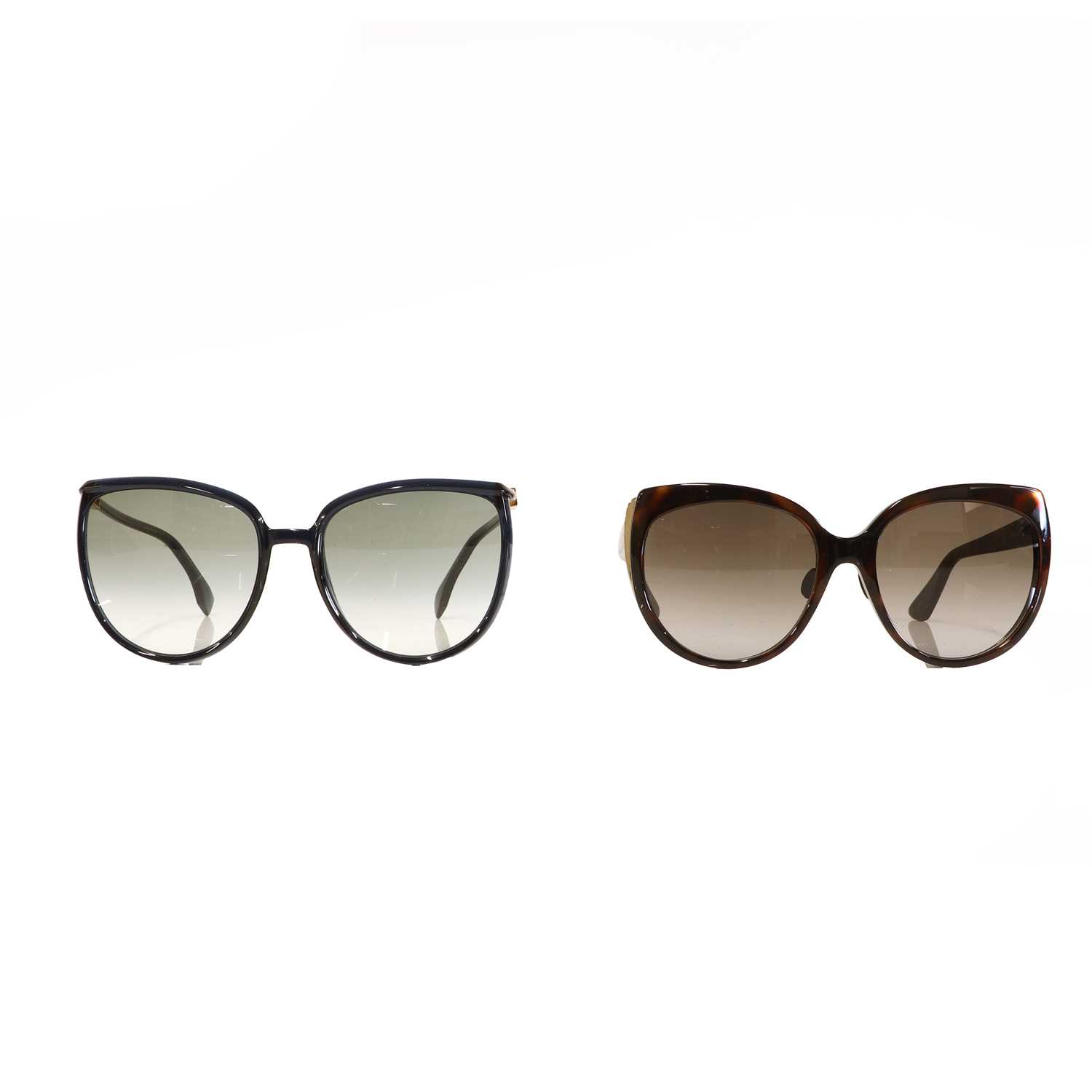 A pair of Christian Dior faux tortoiseshell and silver-rimmed sunglasses,