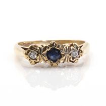 A 9ct gold sapphire and diamond illusion set three stone ring,