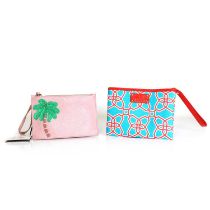 A Kate Spade pink palm tree wrist bag,