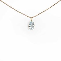 A gold single stone aquamarine pendant,