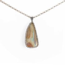 A silver boulder opal pendant,