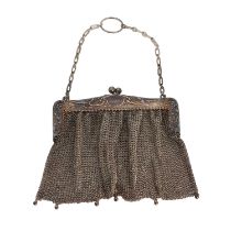 A silver chain mesh purse,