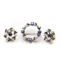 A gold blue paste and seed pearl brooch and earrings set,