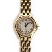 A ladies 18ct gold Cartier 'Panthere Cougar' diamond set quartz bracelet watch, c.1994,