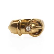 An 18ct gold diamond set buckle ring,