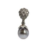 A white gold diamond and cultured grey pearl pendant,
