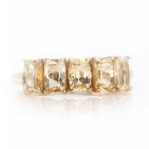 A 9ct gold five stone topaz ring,