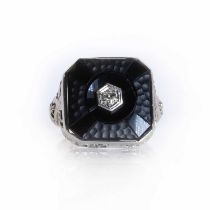A white gold onyx and diamond plaque ring,