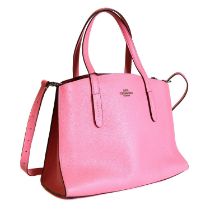 A Coach pink shopper tote,