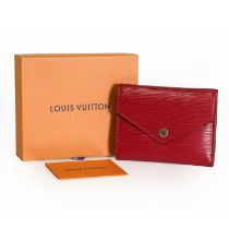 A Louis Vuitton fuschia Victorine wallet,