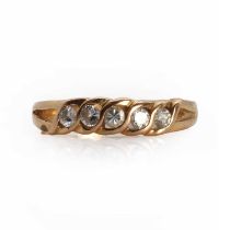 A gold five stone diamond ring,