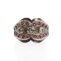 A white gold ruby and diamond bow shaped ring,